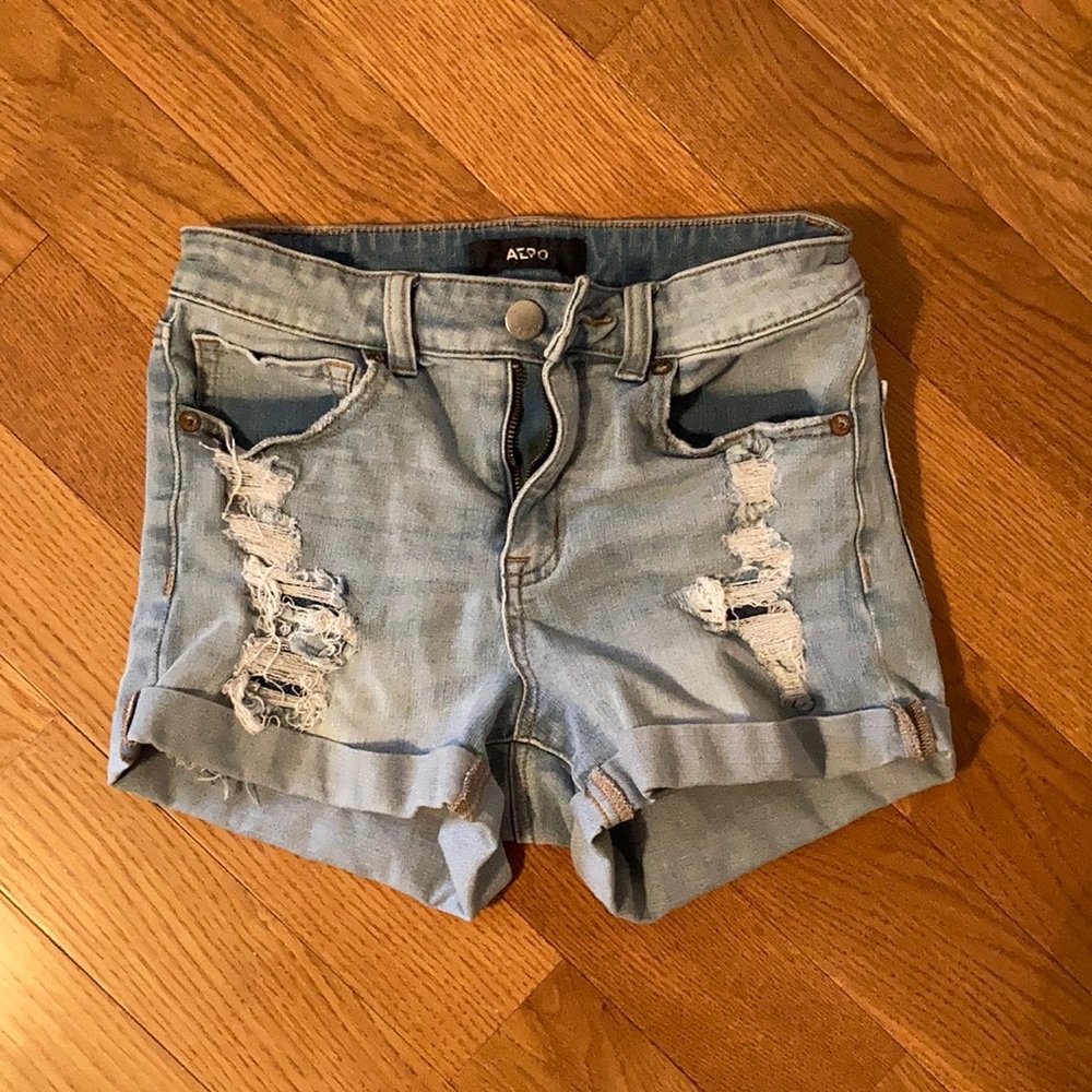 Aero high rise midi distressed light wash shorts